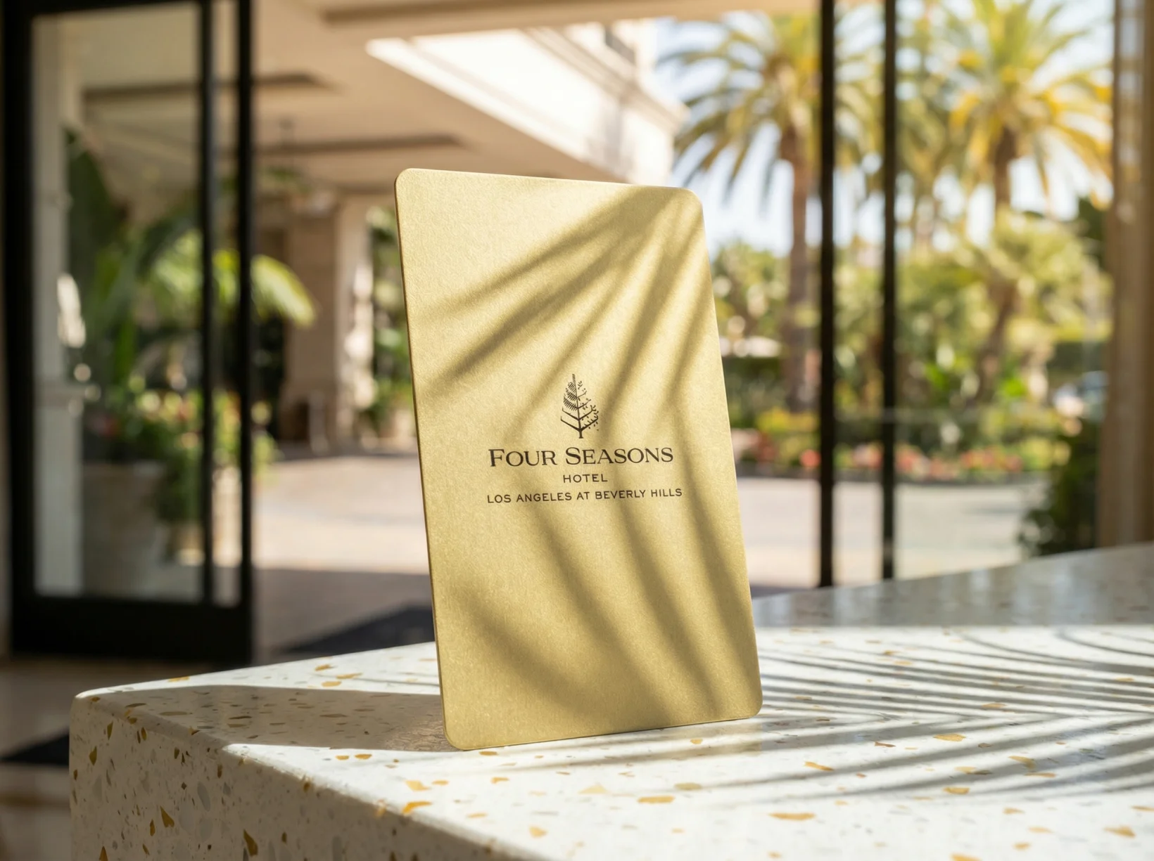 Four Seasons Los Angeles gold PPH Bio key card with wave embossing
