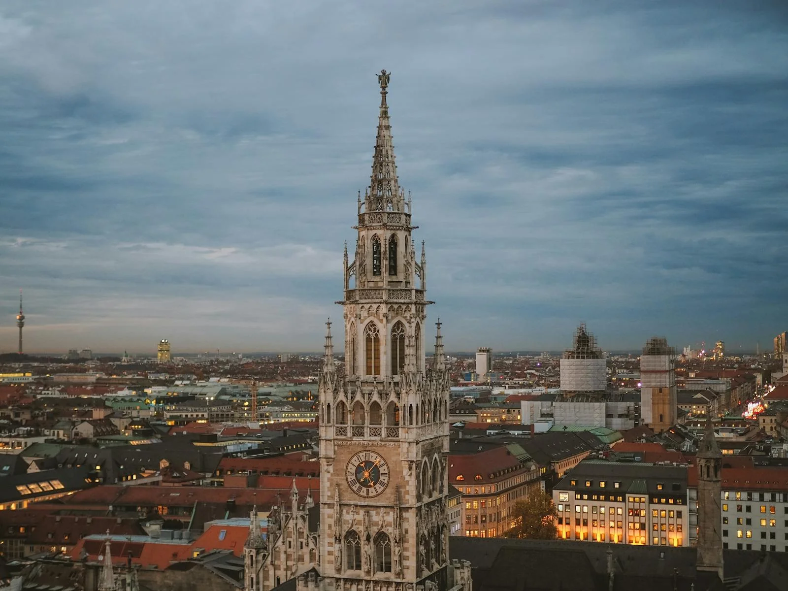 Munich Marienplatz square illuminated at night with the iconic New Town Hall representing the Independent Hotel Show venue